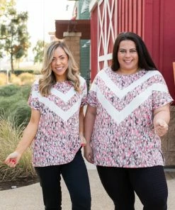 Boutique Simplified Chasing Arrows Short Sleeve Top