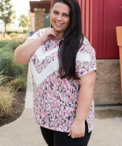 Boutique Simplified Chasing Arrows Short Sleeve Top