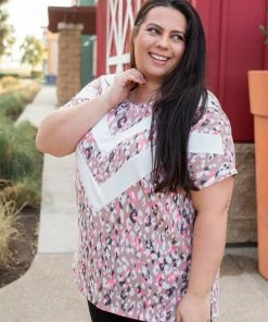 Boutique Simplified Chasing Arrows Short Sleeve Top