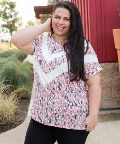 Boutique Simplified Chasing Arrows Short Sleeve Top