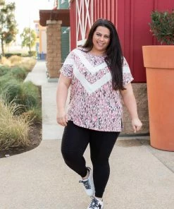 Boutique Simplified Chasing Arrows Short Sleeve Top