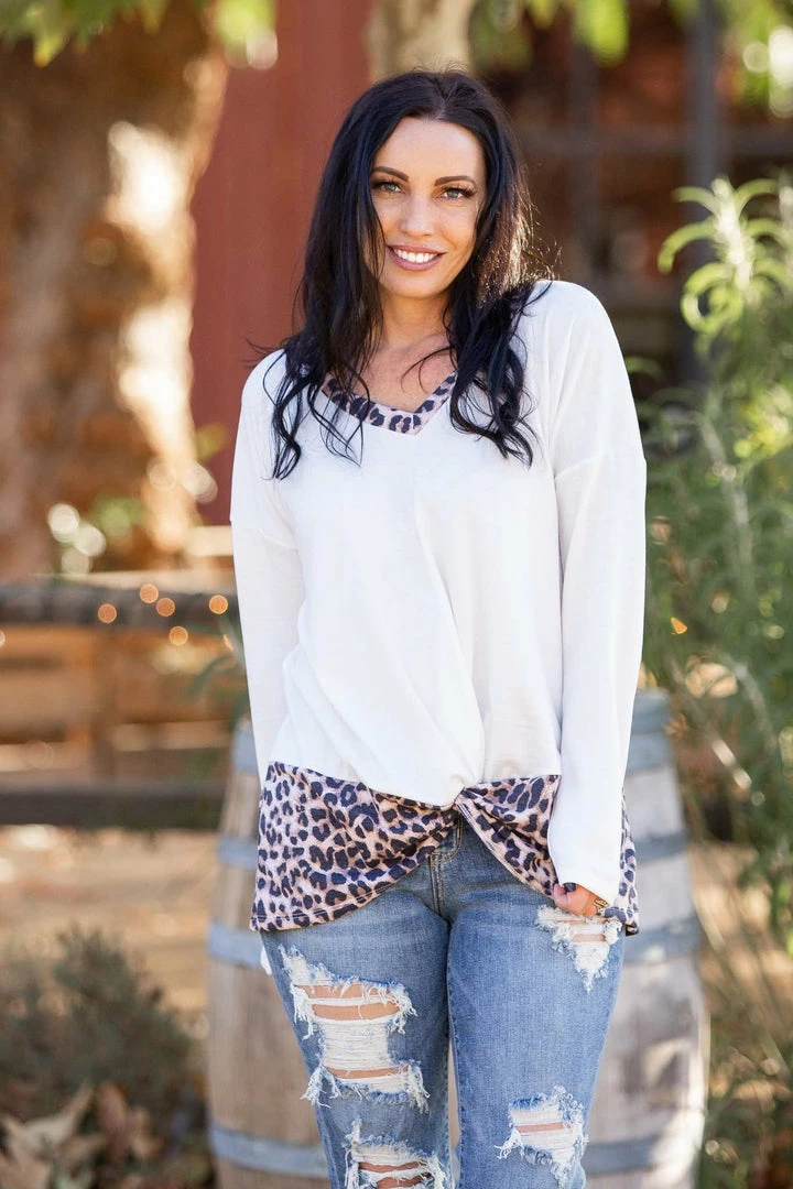 Boutique Simplified Snowy Leopard Front Twist Top 2 Boutique Simplified Snowy Leopard Front Twist Top