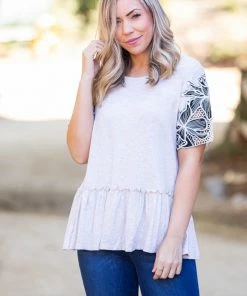 Boutique Simplified Sandy Tropics Peplum Top