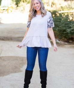 Boutique Simplified Sandy Tropics Peplum Top