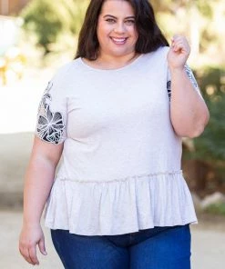 Boutique Simplified Sandy Tropics Peplum Top