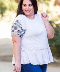 Boutique Simplified Sandy Tropics Peplum Top