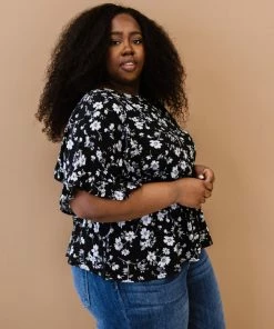 Trendsi Apparel Floral Peplum Blouse