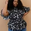 Trendsi Apparel Floral Peplum Blouse