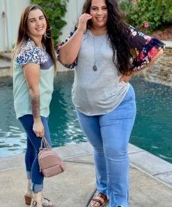 Boutique Simplified Flowy Floral Bell Sleeve Top