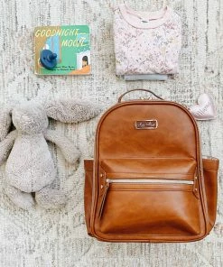 Itzy Ritzy Motherhood + Moments Cognac Itzy Mini™ Diaper Bag Backpack