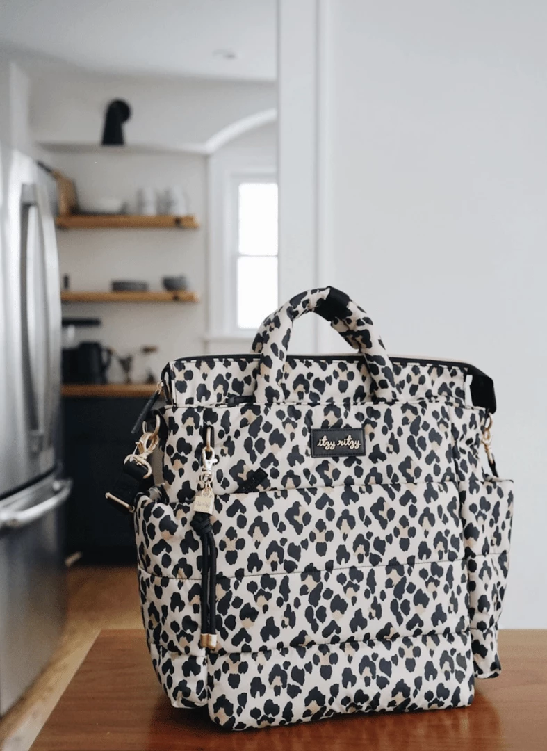 Itzy Ritzy Motherhood + Moments NEW Dream Convertible™ Leopard Diaper Bag 1 Itzy Ritzy Motherhood + Moments NEW Dream Convertible™ Leopard Diaper Bag