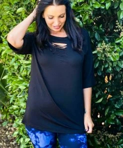 Boutique Simplified Laser Cut Tunic In Black
