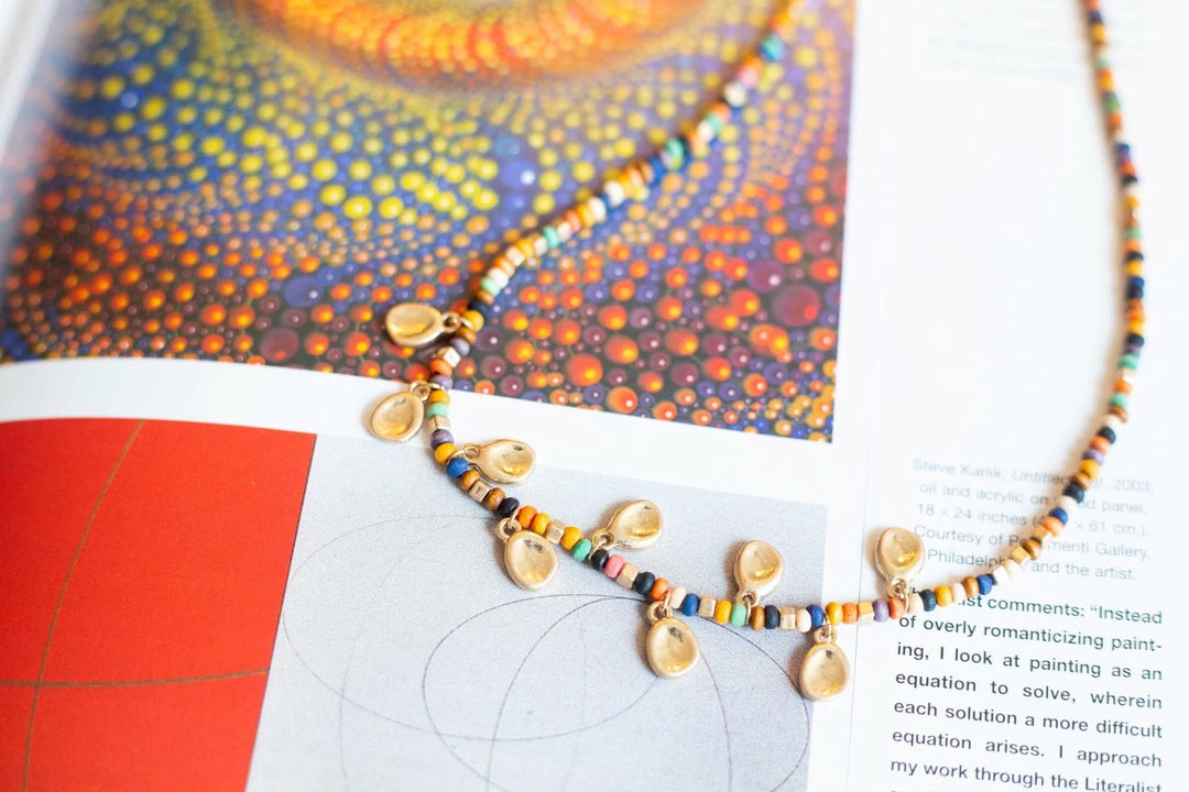 Urbanista Mixed Media Wood Beaded W/ Tear Dropped Metal 3 Urbanista Mixed Media Wood Beaded W/ Tear Dropped Metal