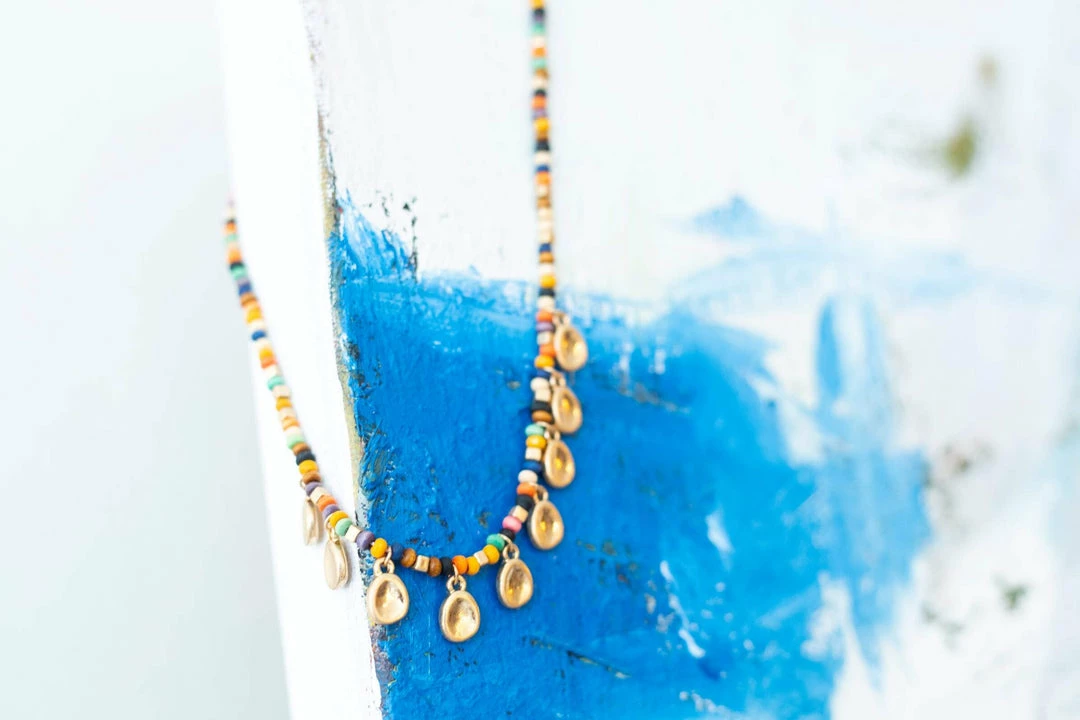 Urbanista Mixed Media Wood Beaded W/ Tear Dropped Metal 5 Urbanista Mixed Media Wood Beaded W/ Tear Dropped Metal